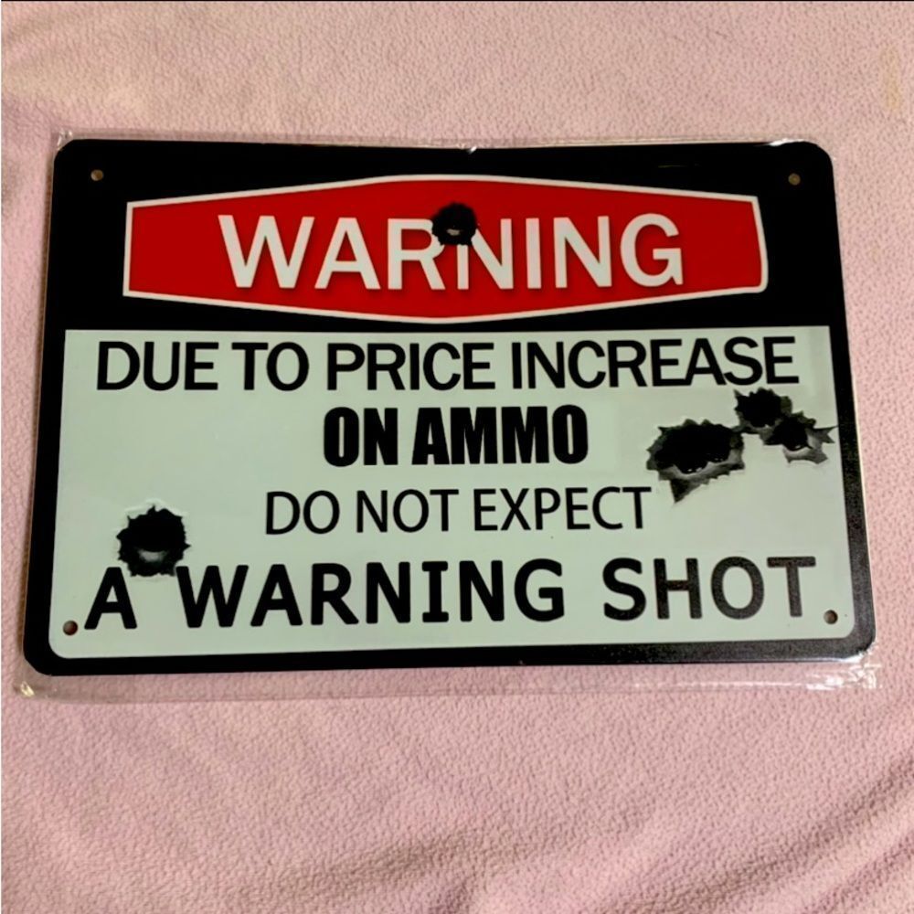 Funny Metal No Trespassing Sign with predrilled holes for hanging